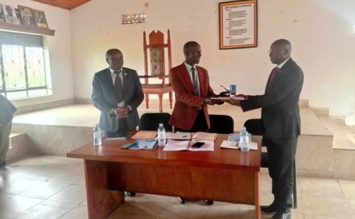 Robert Nuwamanya receiving tools