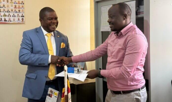 Nsubuga handing over to Ongom