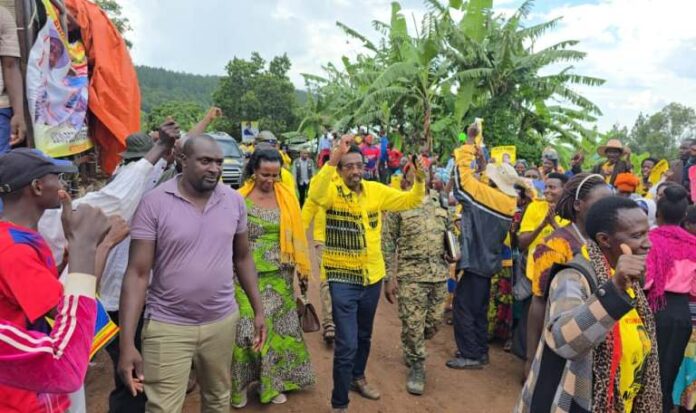 Minister Jim Muhwezi, his wife Can Susan Muhwezi and supporters in Bugangari