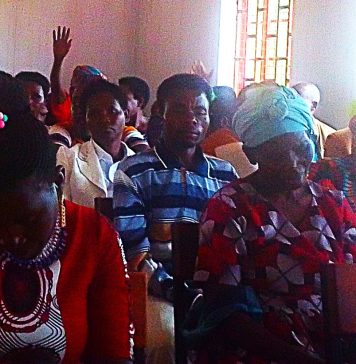 Bikurungu residents demand the reopening of a closed access road to Bikurungu seed school.